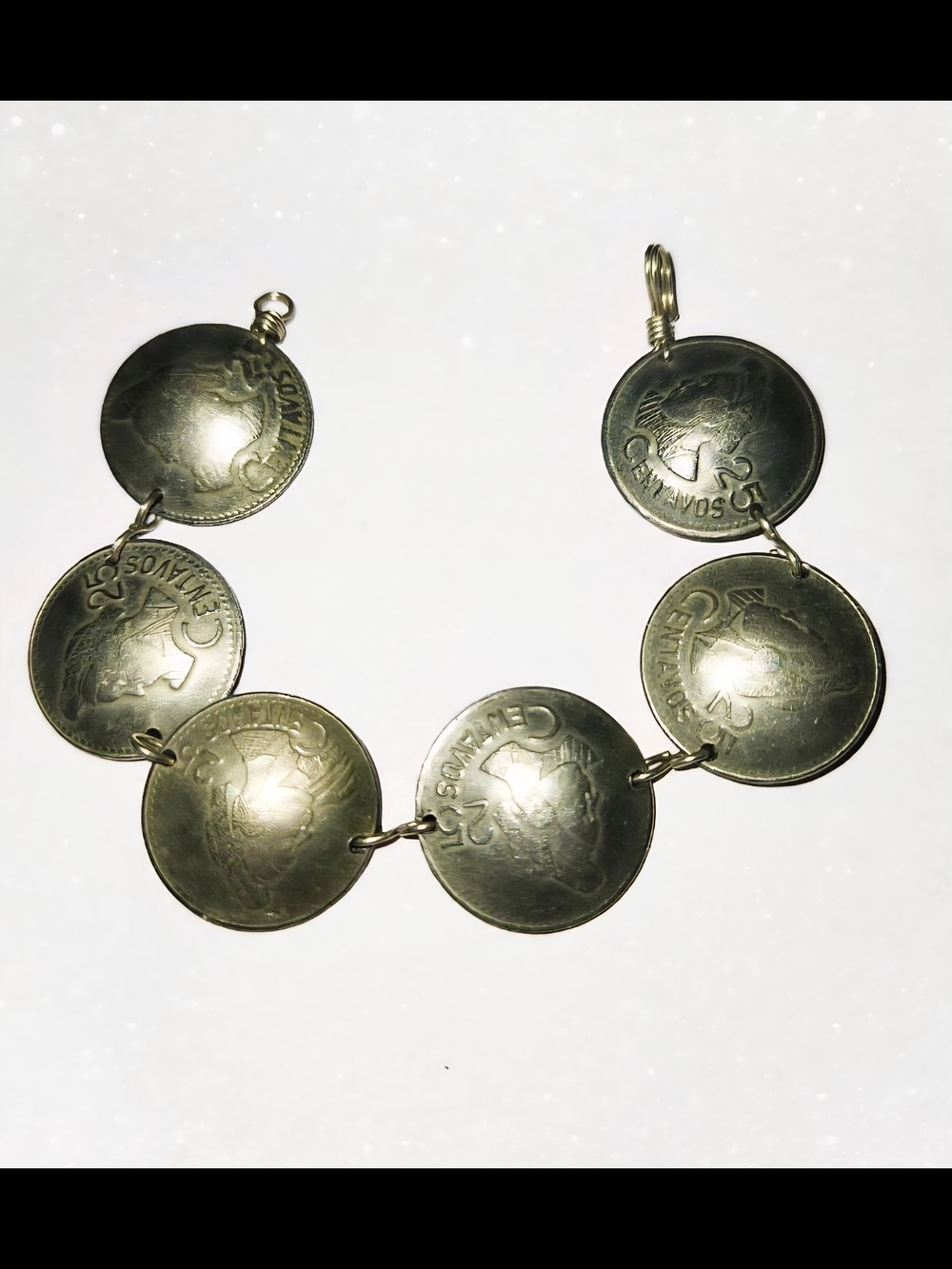 Vintage bracelet is made from six Brazilian 25 Centavos coins